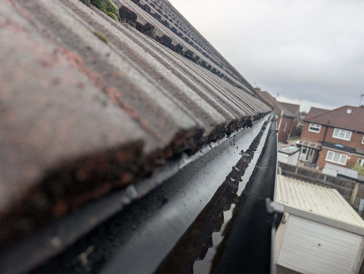 Gutter cleared as part of a roof clean